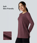T-shirt doux col rond ourlet fendu manches raglan longues