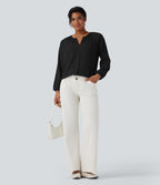 Blouse texturée col rond manches longues ourlet arrondi