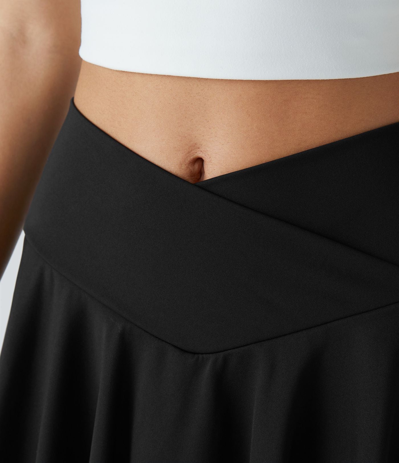 Jupe de tennis SoftlyZero™ Airy taille haute confortable 2-en-1 poches latérales croisées évasée effet frais