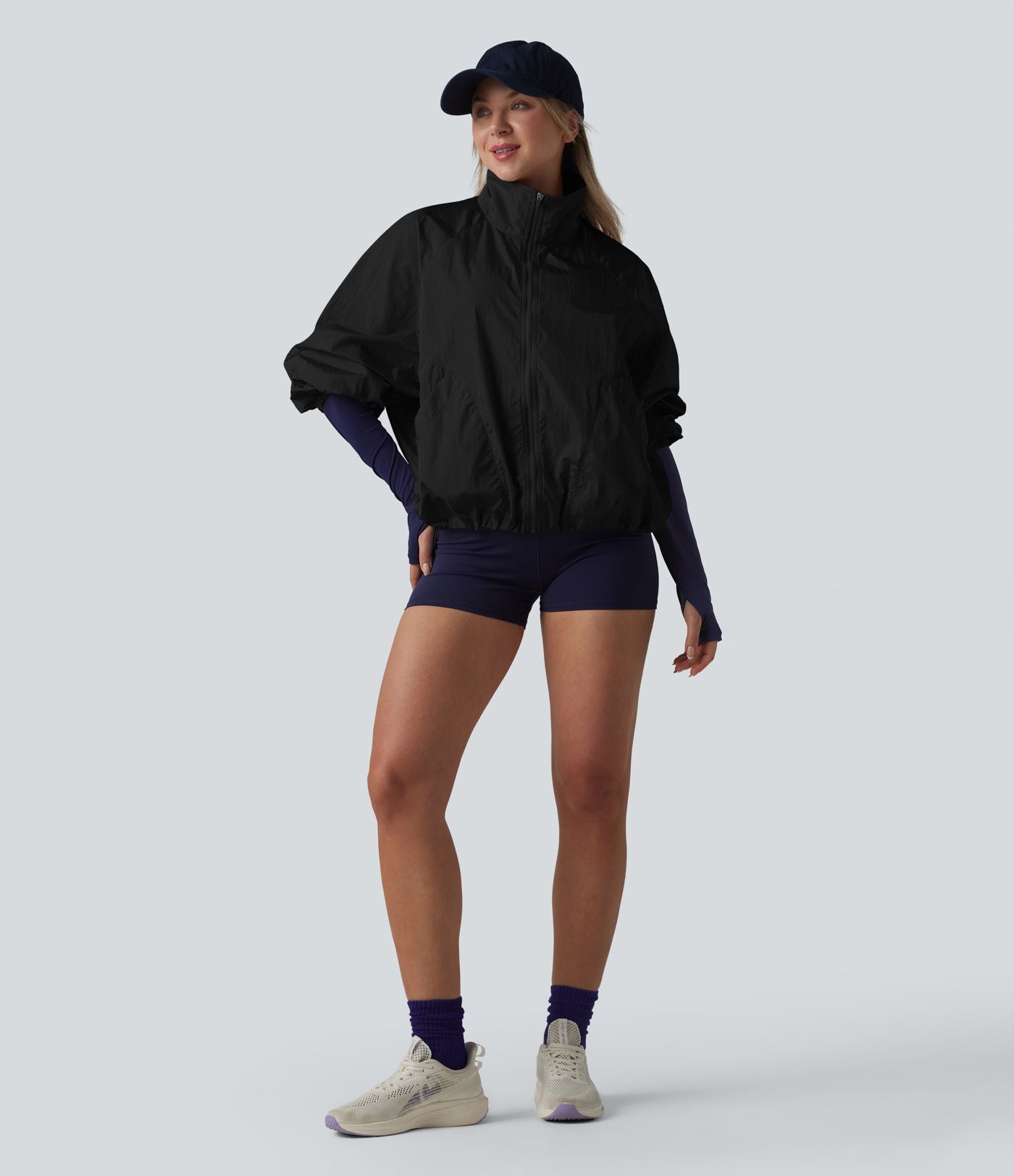 Veste de sport déperlante col montant manches longues zippée avec poches