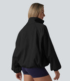 Veste de sport déperlante col montant manches longues zippée avec poches