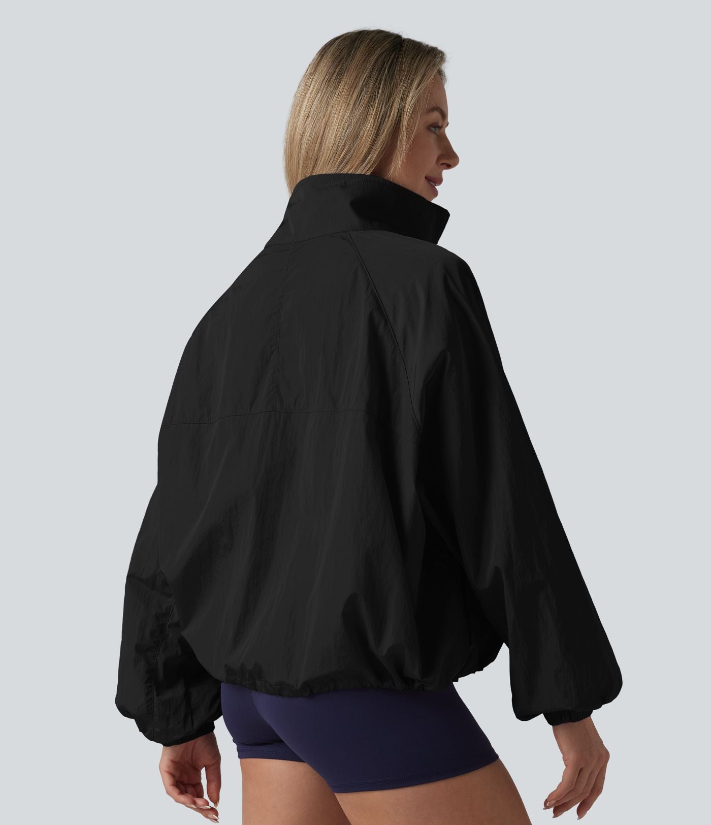 Veste de sport déperlante col montant manches longues zippée avec poches