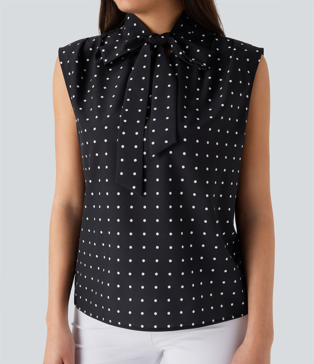 Chemise de travail sans manches à pois avec nœud devant