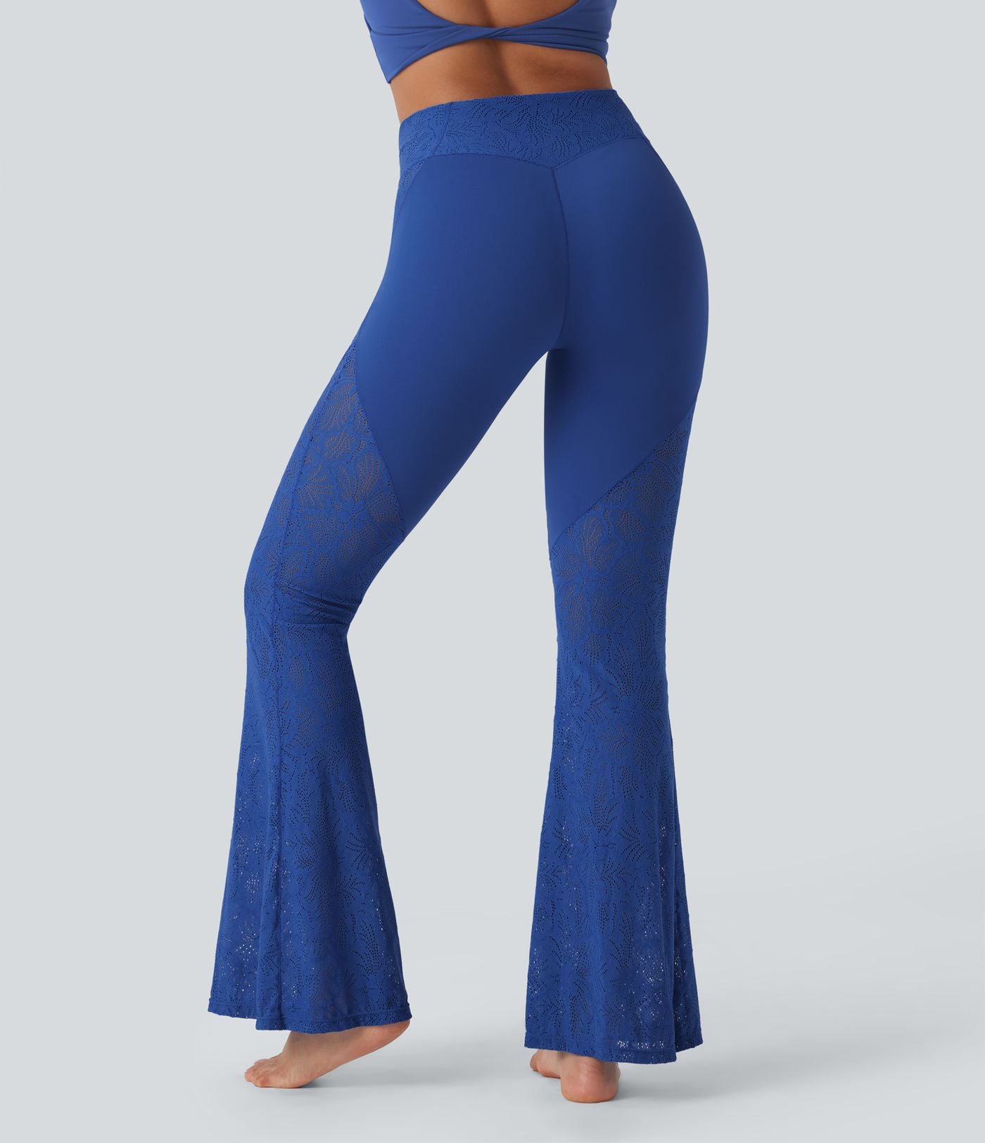 Pantalon de yoga évasé à taille haute croisée, poche arrière et dentelle
