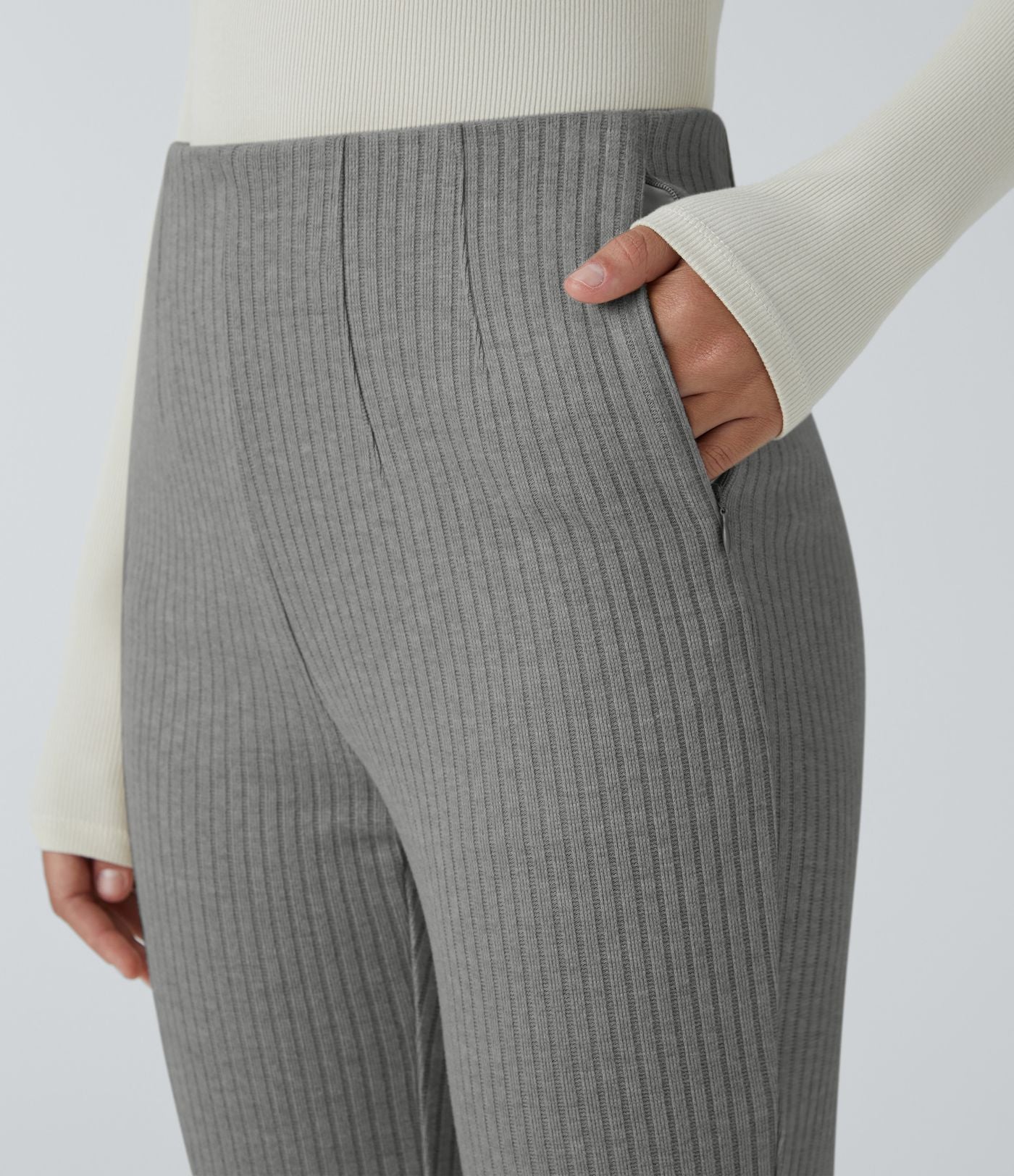 Pantalon décontracté évasé en maille côtelée à taille haute et poches zippées latérales