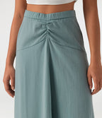 Jupe longue taille haute ourlet asymétrique aspect lin