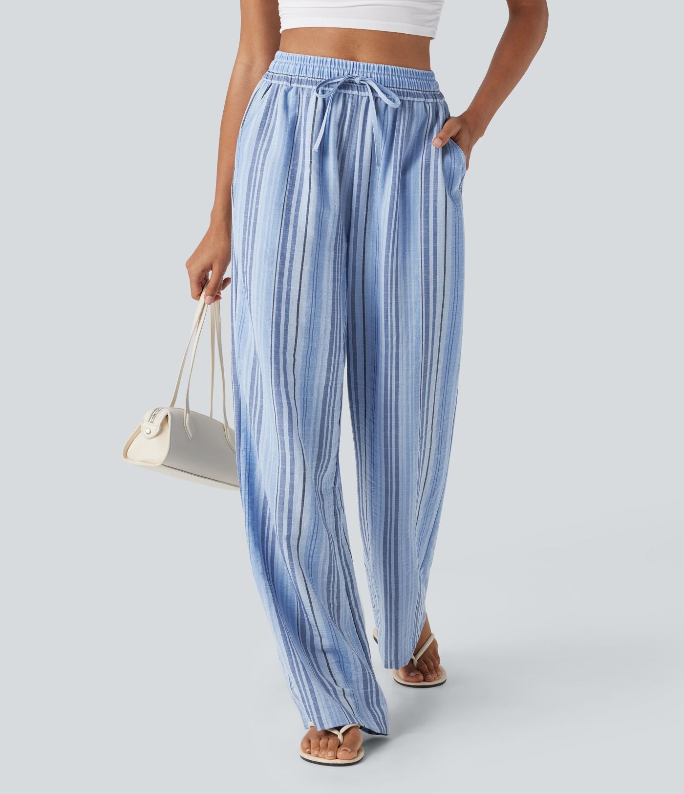 Pantalon large fluide taille haute avec cordon de serrage, rayures, aspect lin et poches latérales