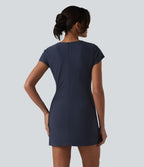 Robe de bureau mini moulante col rond manches courtes avec fermeture éclair invisible et poches