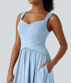 Robe midi fluide sans manches dos croisé ouvert avec poches