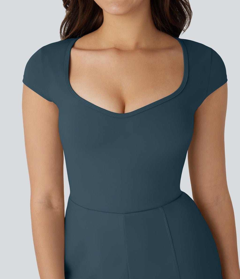 Combinaison de yoga Softlyzero™ Airy avec col U, manches courtes et poches latérales - Édition Easy Peasy