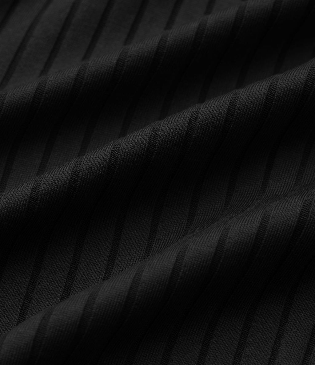 Short en maille côtelée taille mi-haute à cordon de serrage et ourlet ondulé 10 cm avec poches