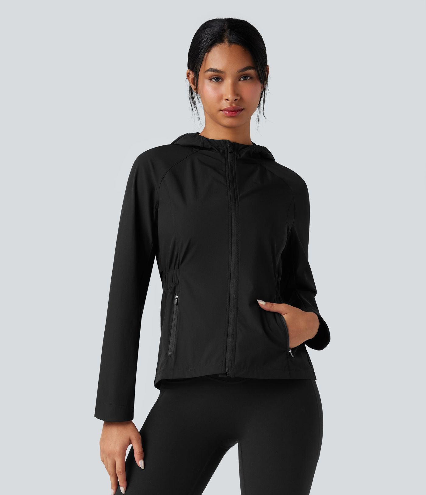 Veste de randonnée déperlante résistante à l'abrasion à capuche avec mesh contrastant et poches
