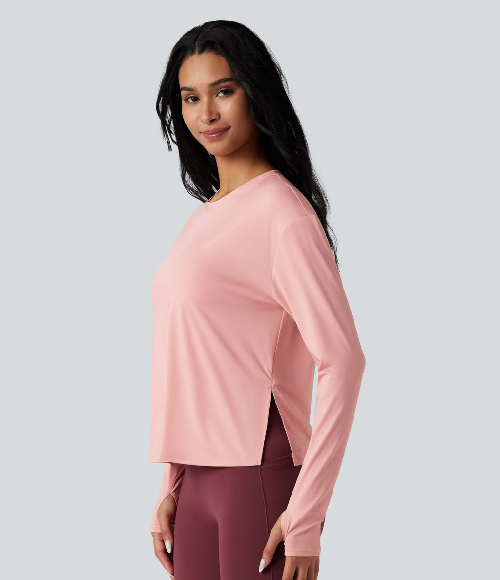 Top de sport running col rond fendu manches longues avec trous pouces