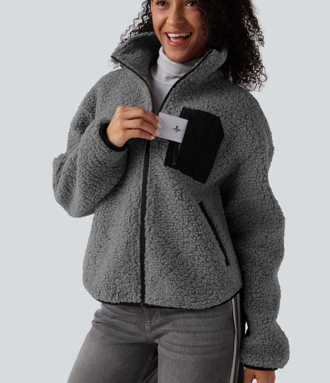 Veste sherpa col roulé manches longues avec poches