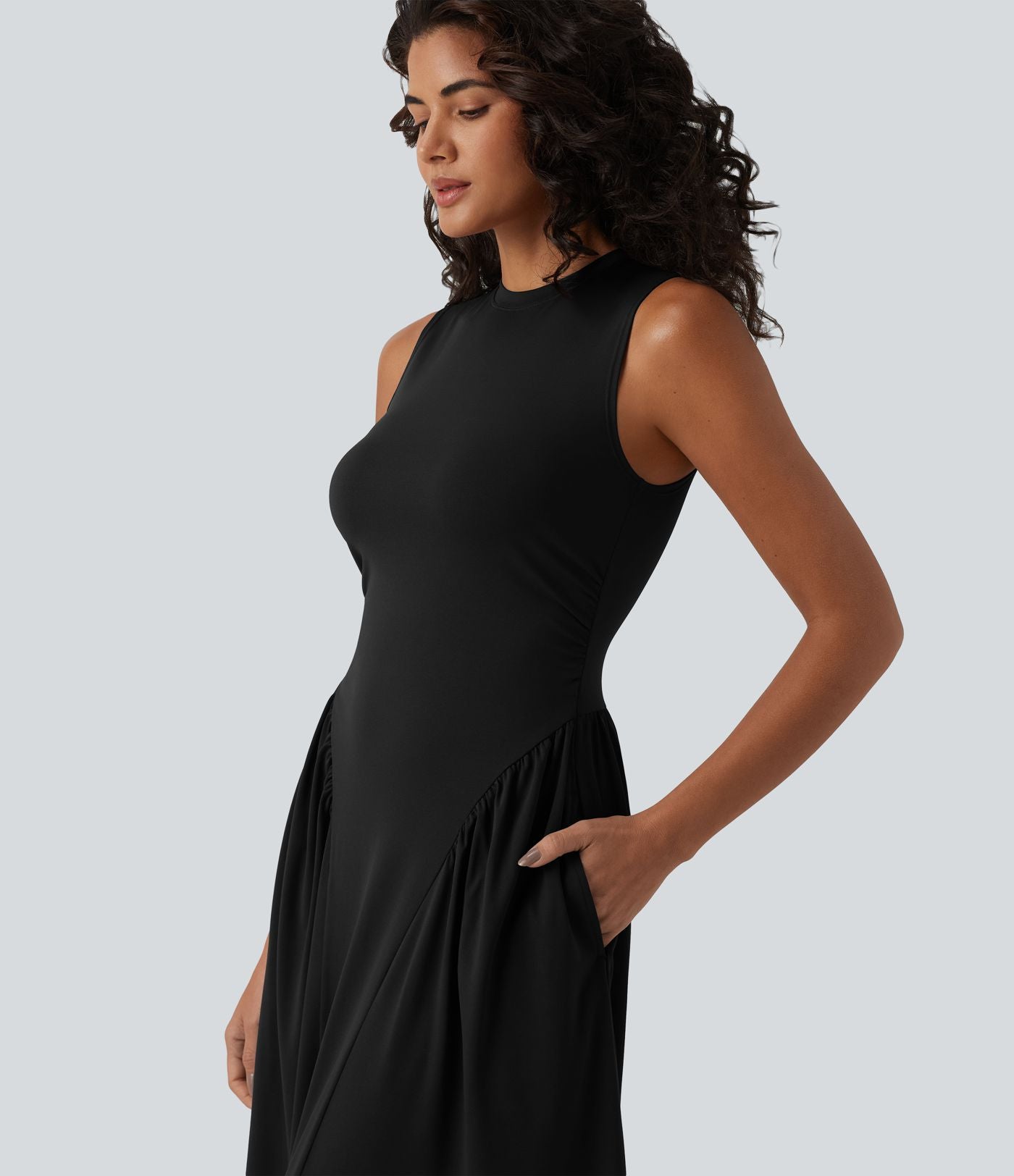 Robe midi casual fluide sans manches à col rond avec poches
