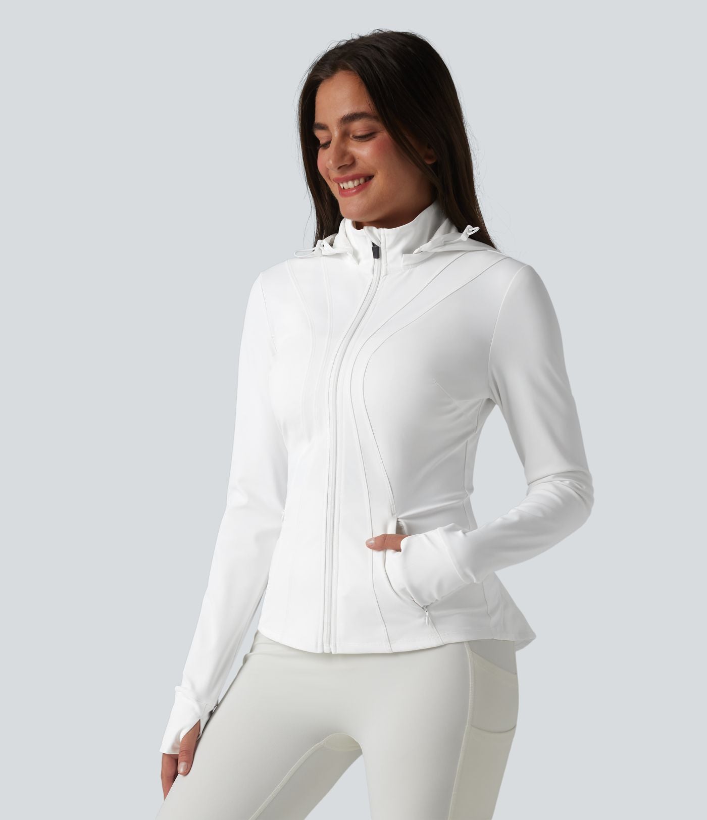 Veste de randonnée ajustée capuche amovible à trous pouces ourlet volants