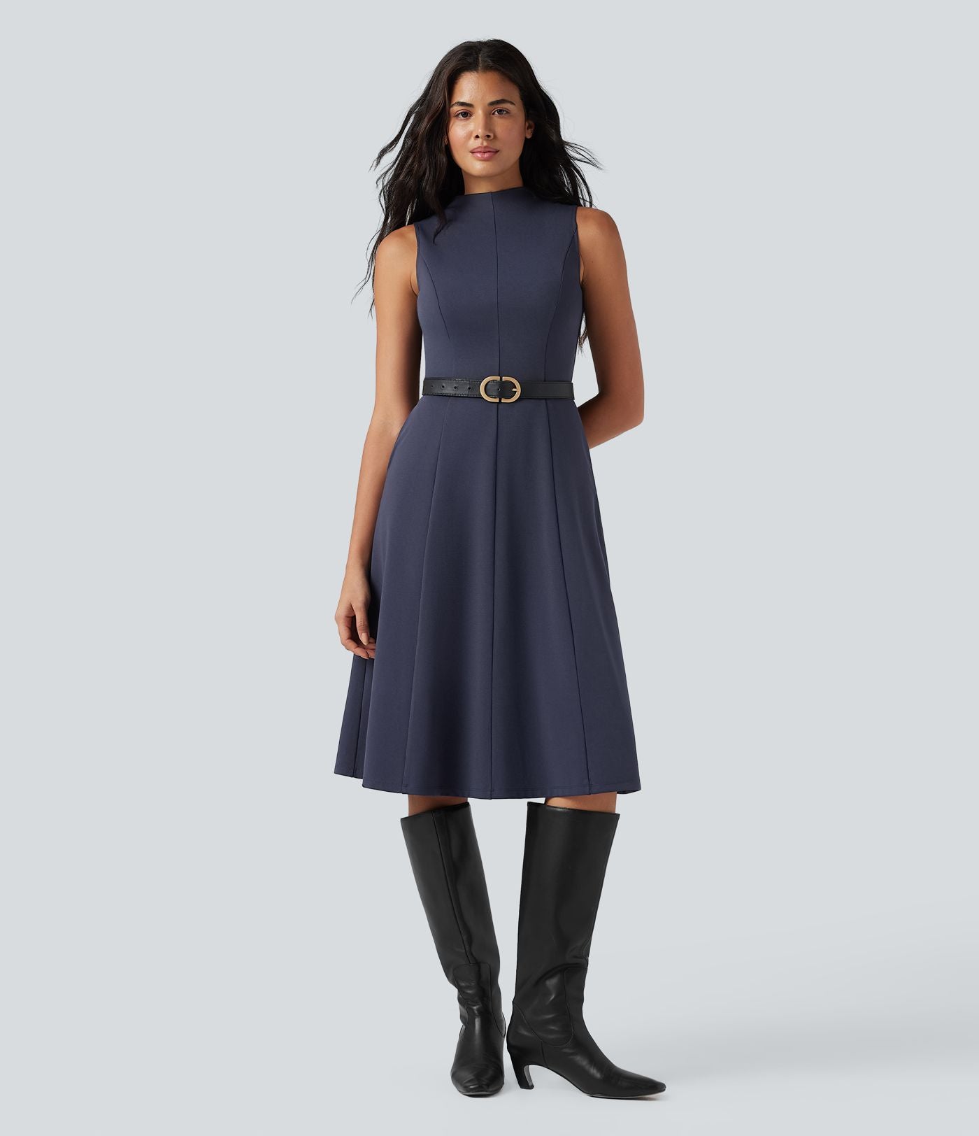 Robe mi-longue col montant sans manches avec poches