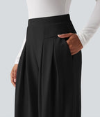 Pantalon tailleur jambes larges taille haute avec poches