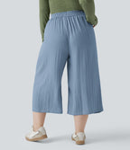 Pantalon grande taille large fluide taille haute avec cordon de serrage, poches et aspect lin