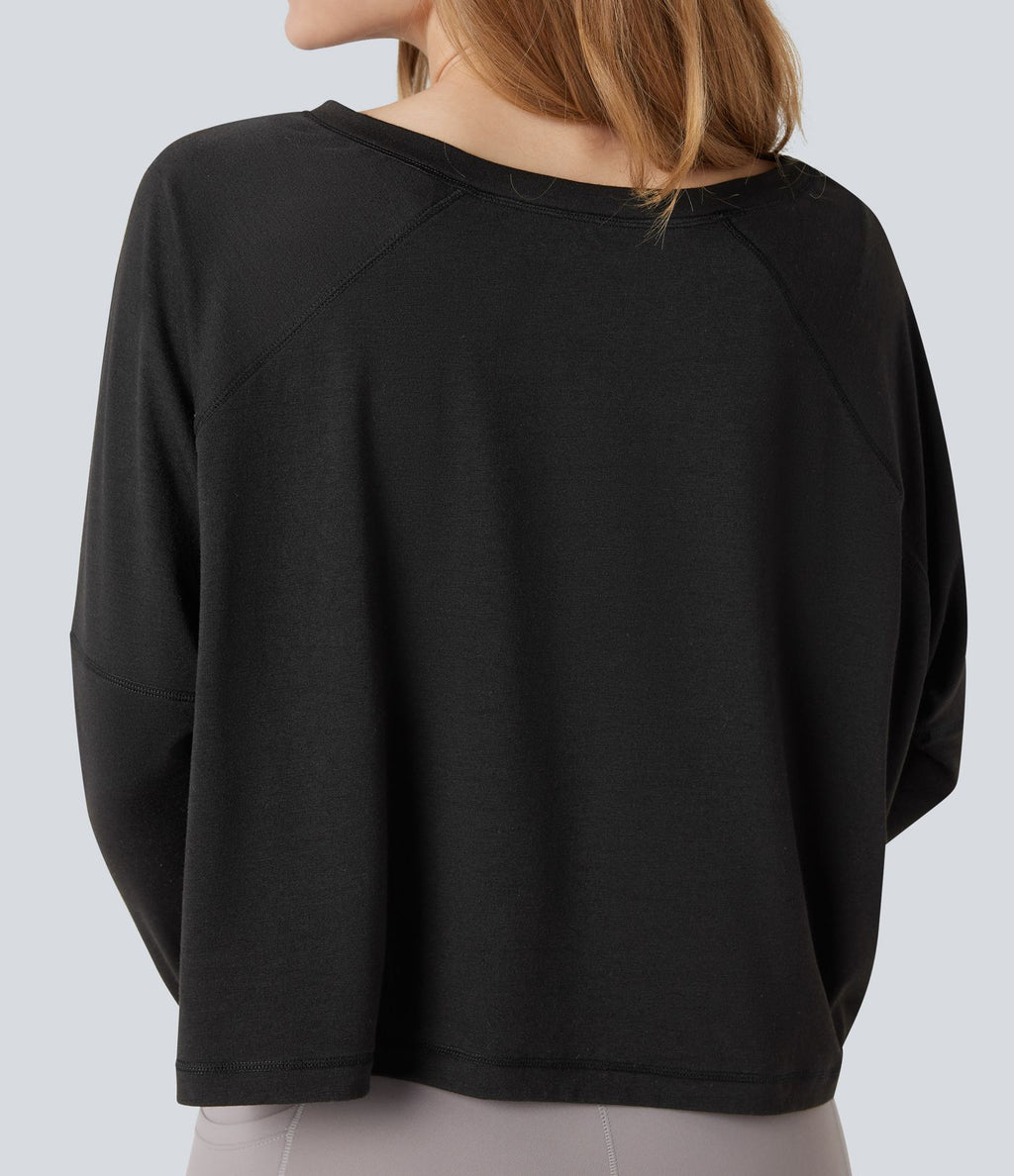 Top de sport running asymétrique col rond coupe décontractée manches longues avec trous pouces