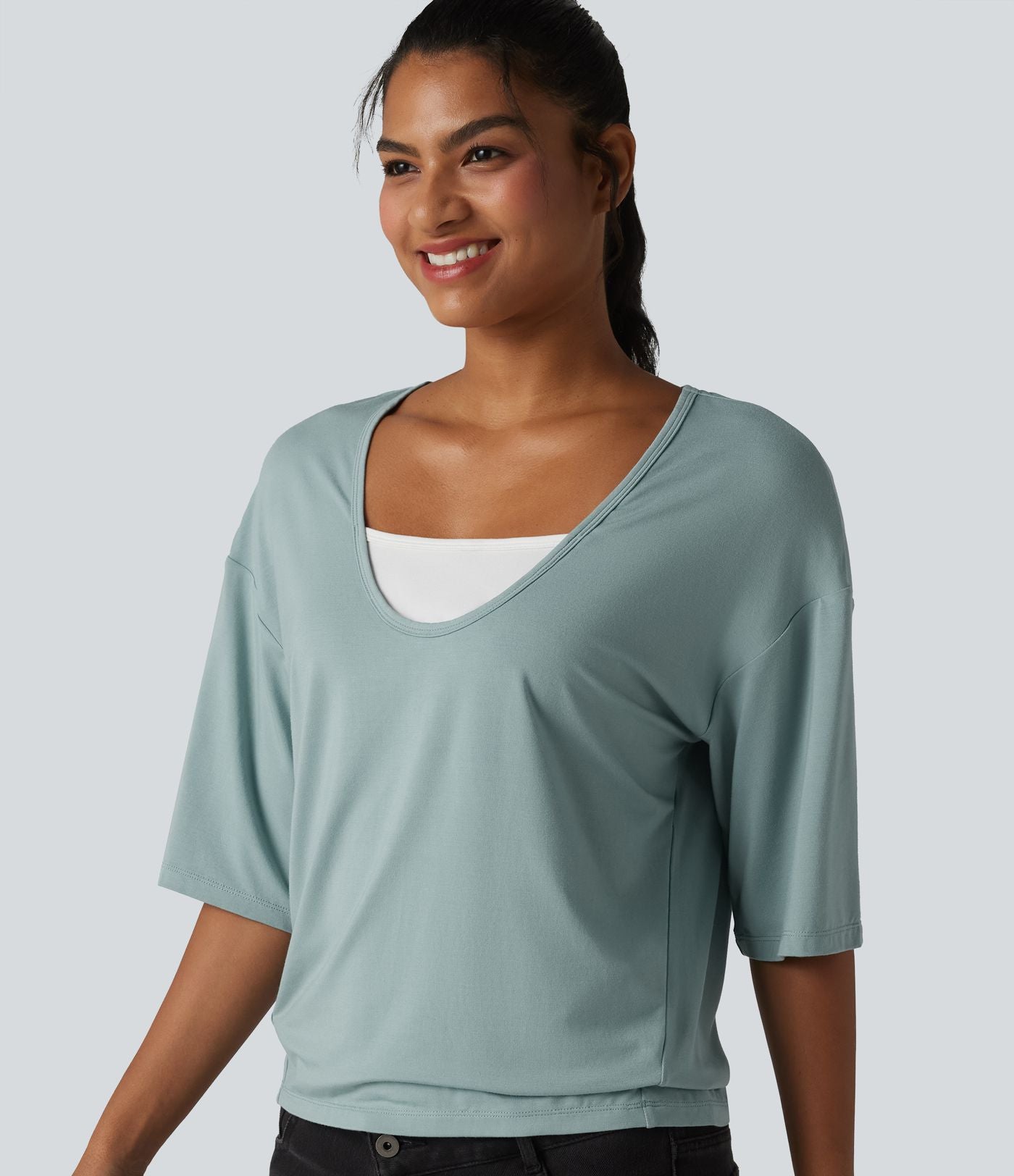 Haut décontracté col rond échancré manches mi-longues color block