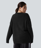Pull grande taille col rond épaules tombantes à manches longues