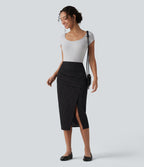 Jupe midi moulante tailleur taille haute croisée à rayures et ourlet fendu