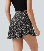 Jupe-short de tennis mini taille haute croisée imprimé léopard avec poches