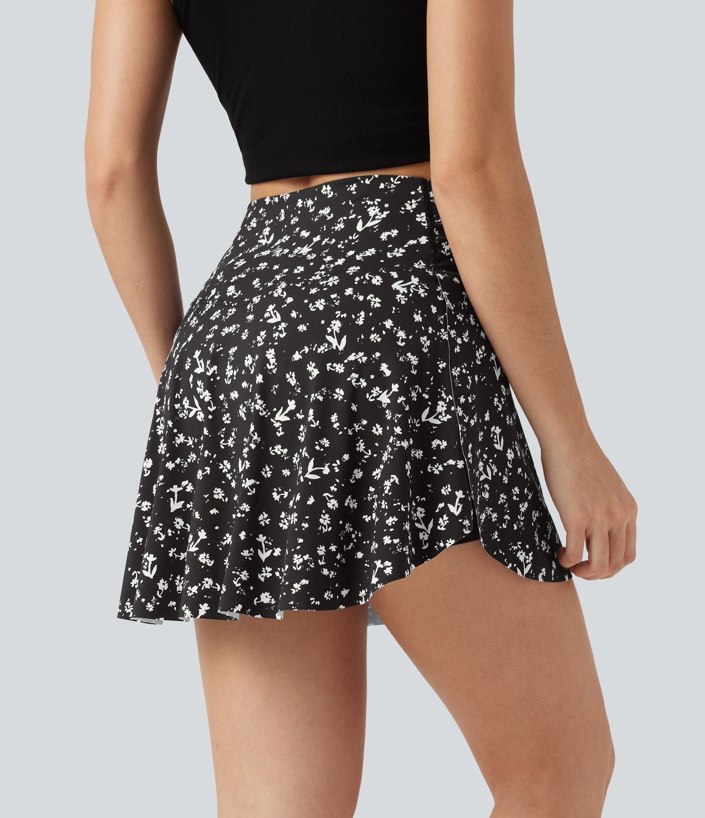 Jupe-short de tennis mini taille haute croisée imprimé léopard avec poches