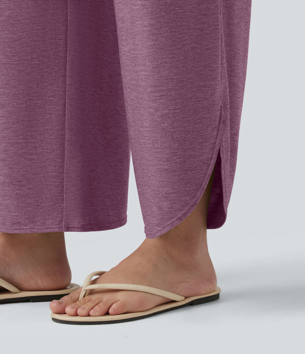 Pantalon décontracté taille haute gainant avec ourlet arrondi et poches