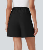 Short tailleur taille haute avec bouton, fermeture éclair et poches latérales