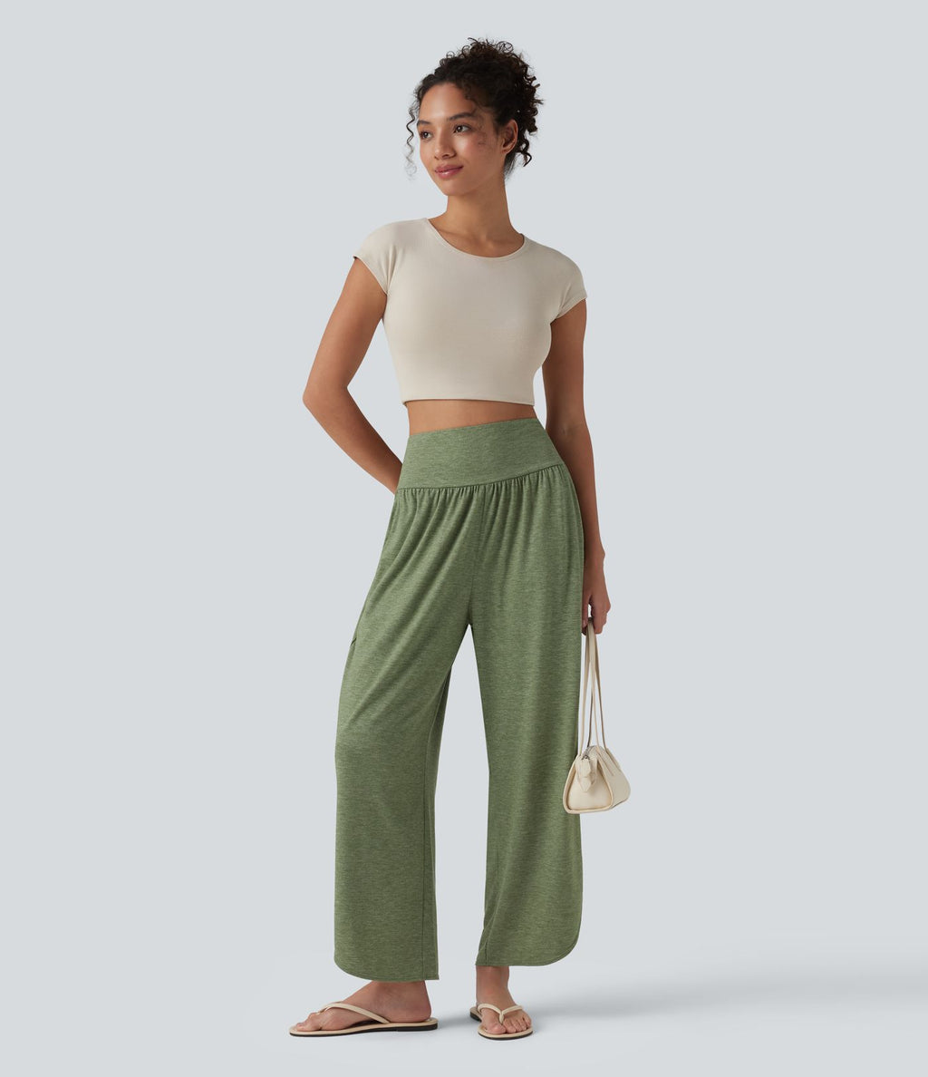 Pantalon décontracté taille haute gainant avec ourlet arrondi et poches