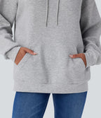 Sweat-shirt décontracté à capuche avec cordon de serrage, manches longues, poche kangourou, coupe croisée et fente