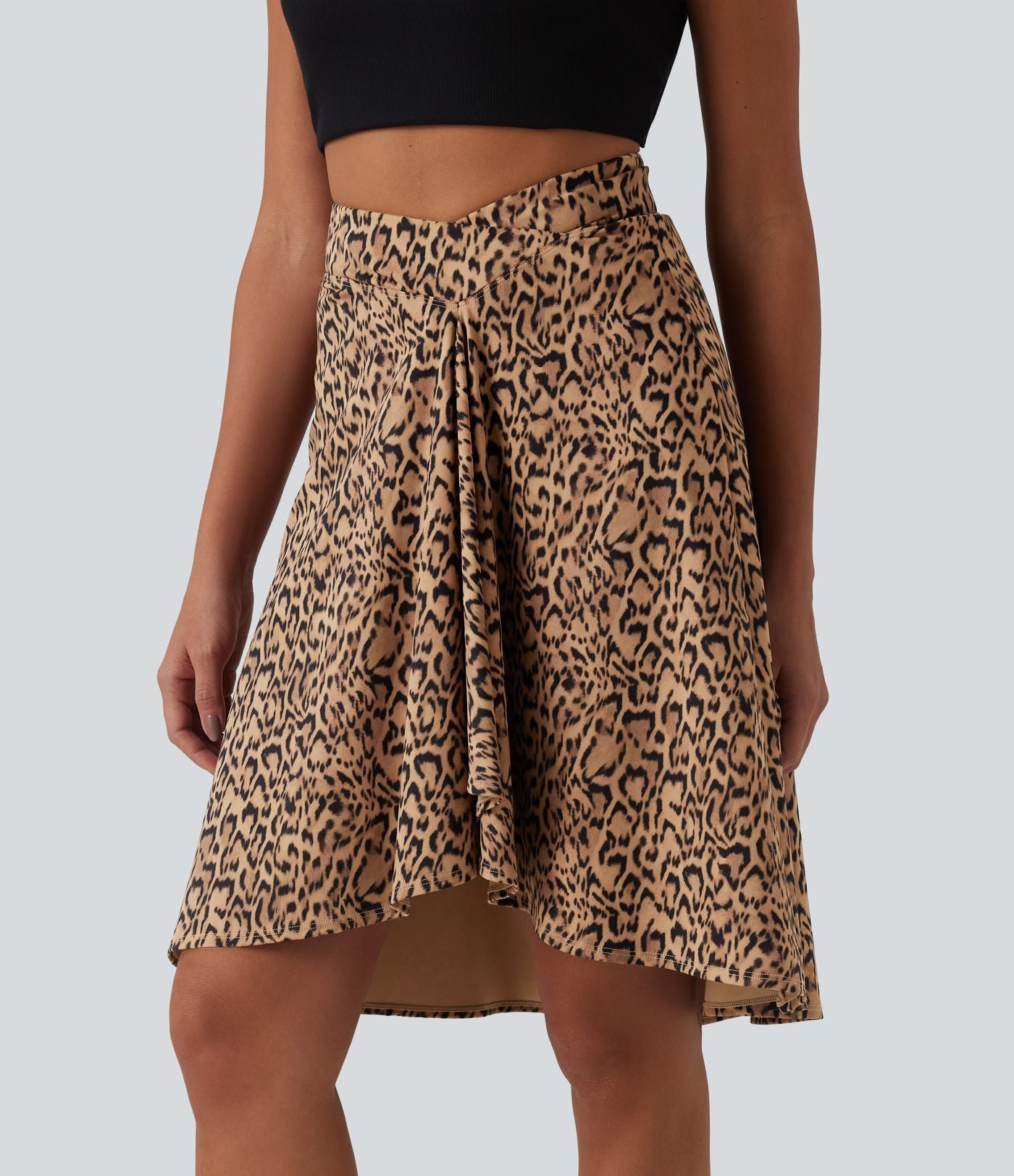 Jupe resort taille haute croisée ourlet asymétrique