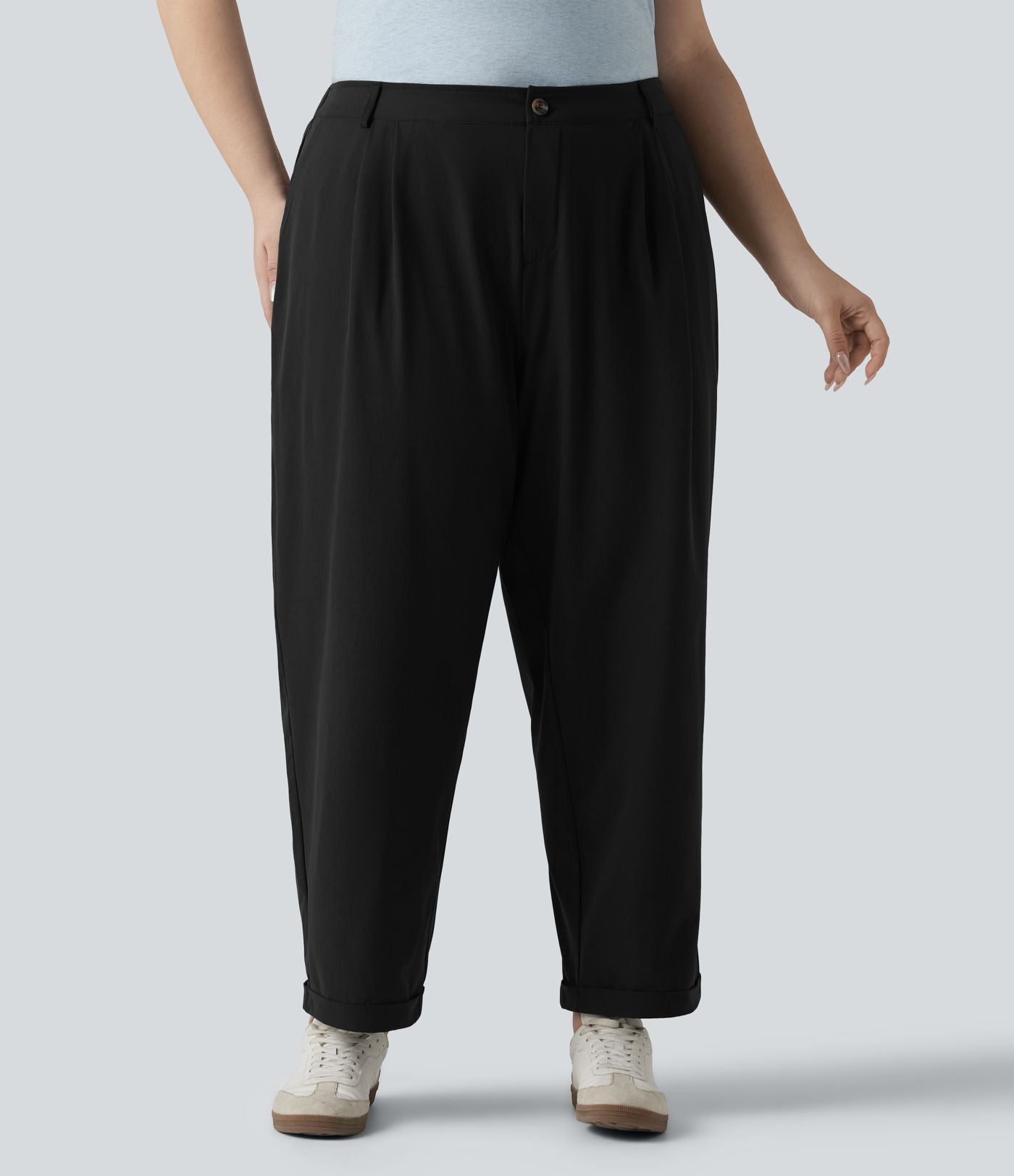 Pantalon grande taille en popeline stretch taille haute, plissé avec ourlet roulotté, longueur 7/8, coupe fuselée, avec poches