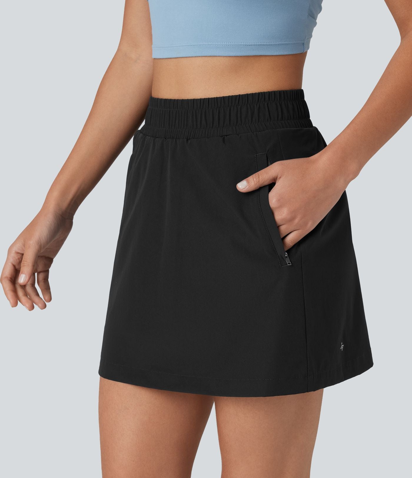Jupe mini trapèze 2-en-1 taille haute avec boutons-pression et poches pour la randonnée