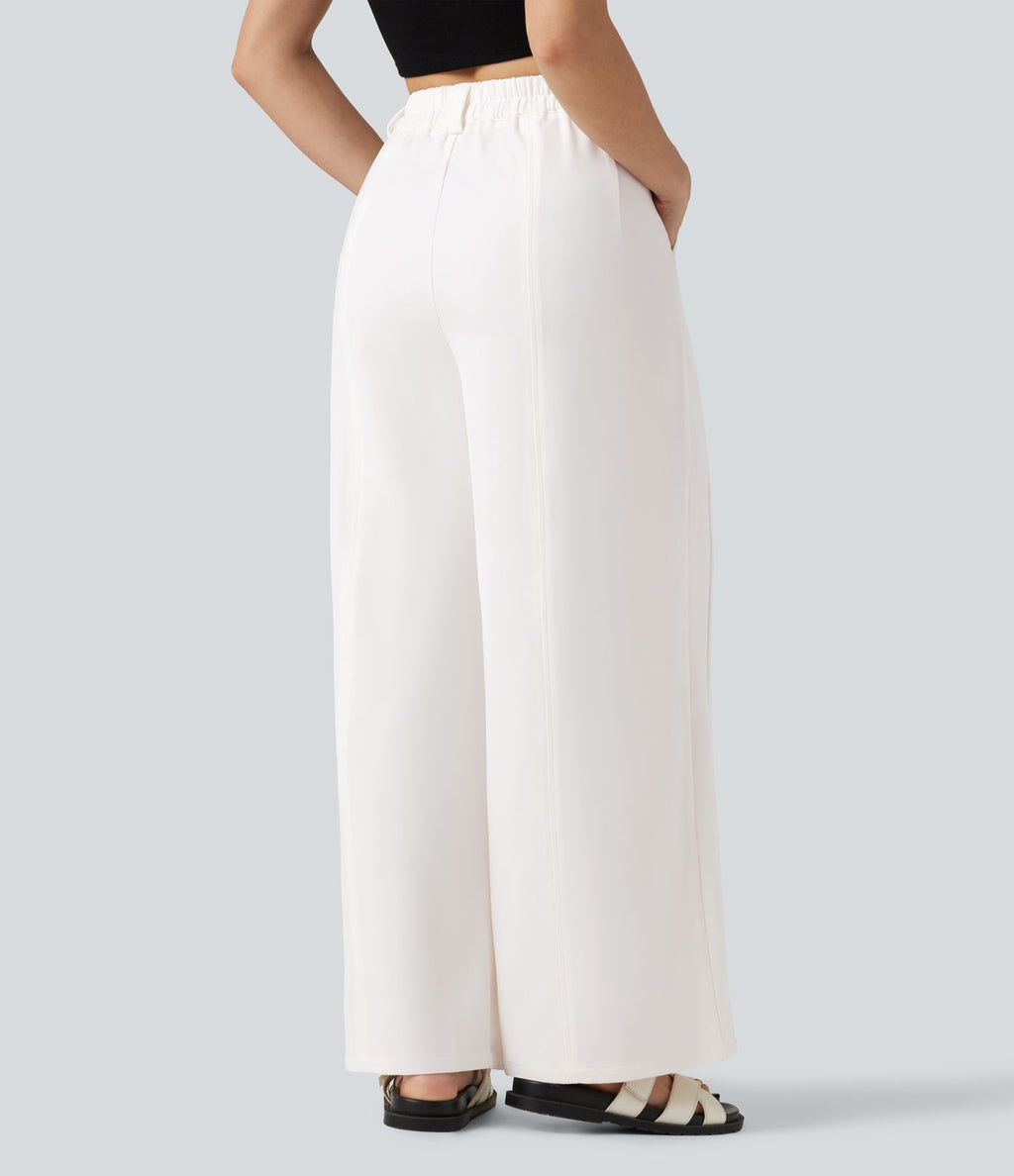 Pantalon tailleur large, taille moyenne, à poches
