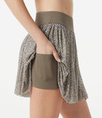 Jupe de sport mini 2-en-1 fluide taille mi-haute en mesh léopard avec poche