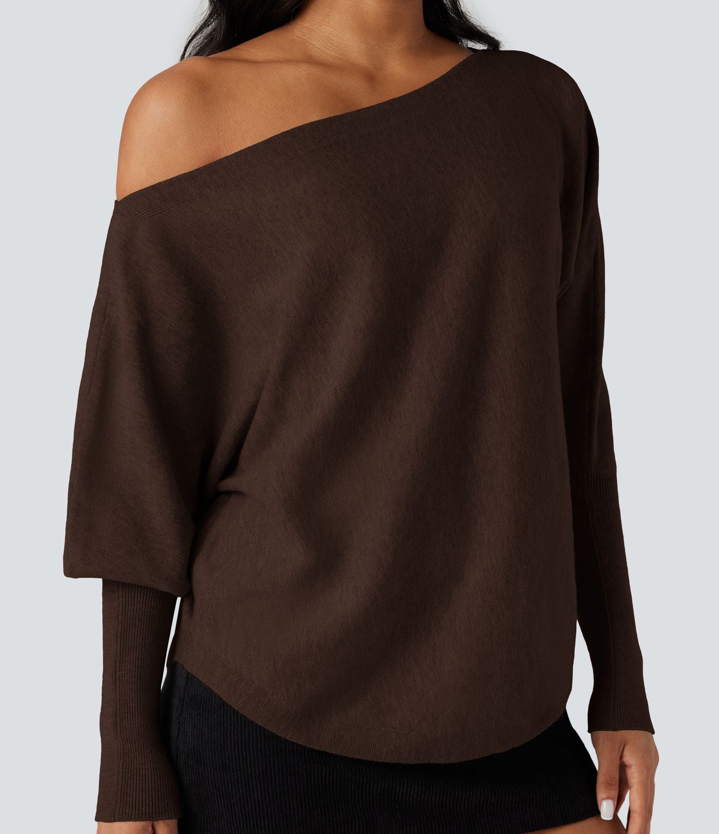 Pull une épaule manches chauve-souris ourlet arrondi