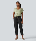 Pantalon casual en coton et lin coupe fuselée taille haute avec poches
