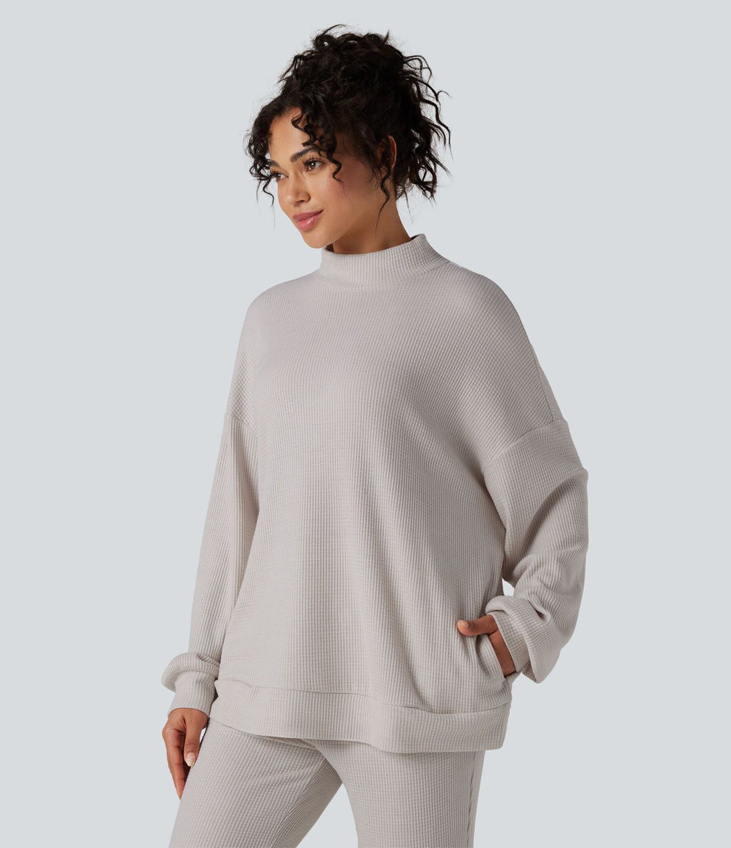 Sweat-shirt gaufré col montant manches longues coupe décontractée avec poches