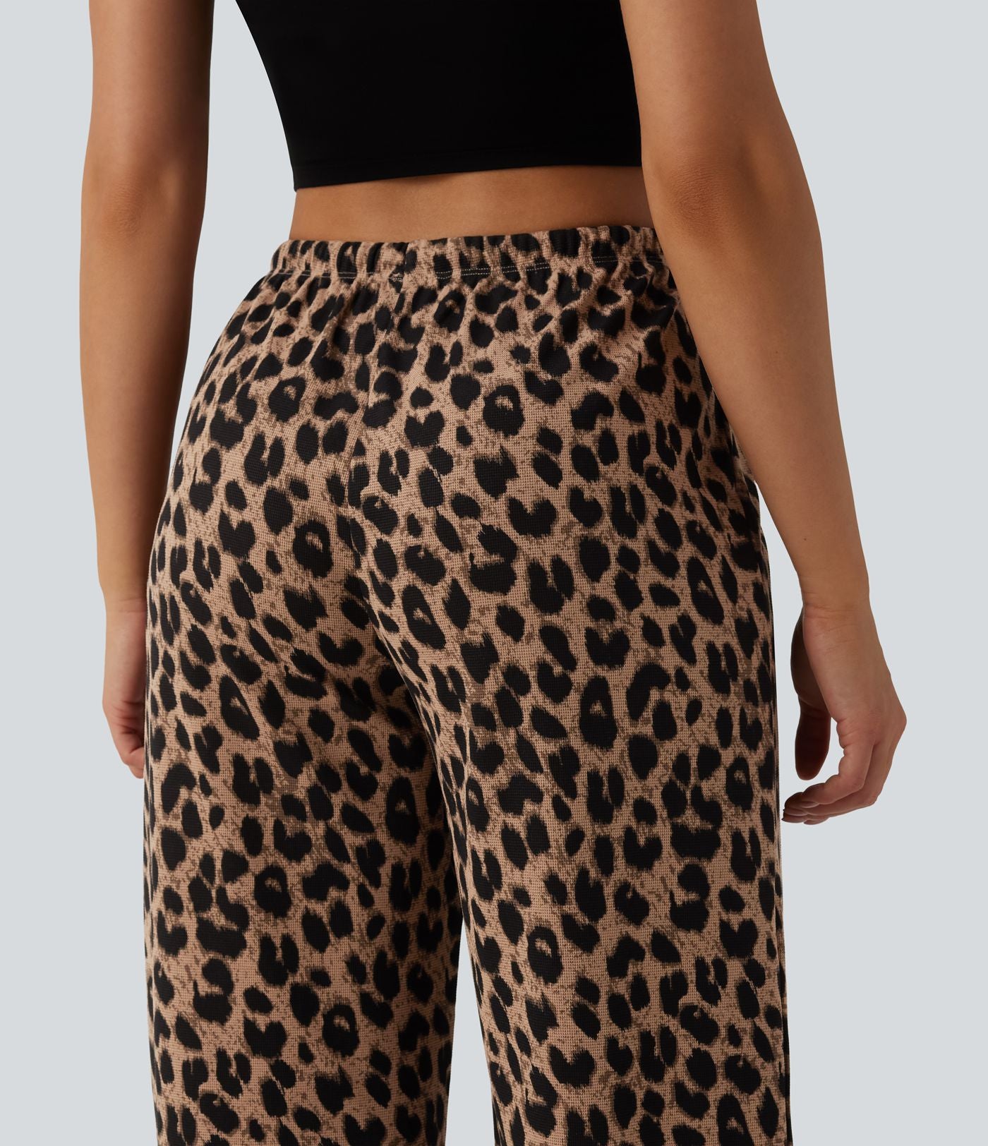 Pantalon large casual en maille gaufrée imprimé léopard taille mi-haute avec cordon de serrage et poches
