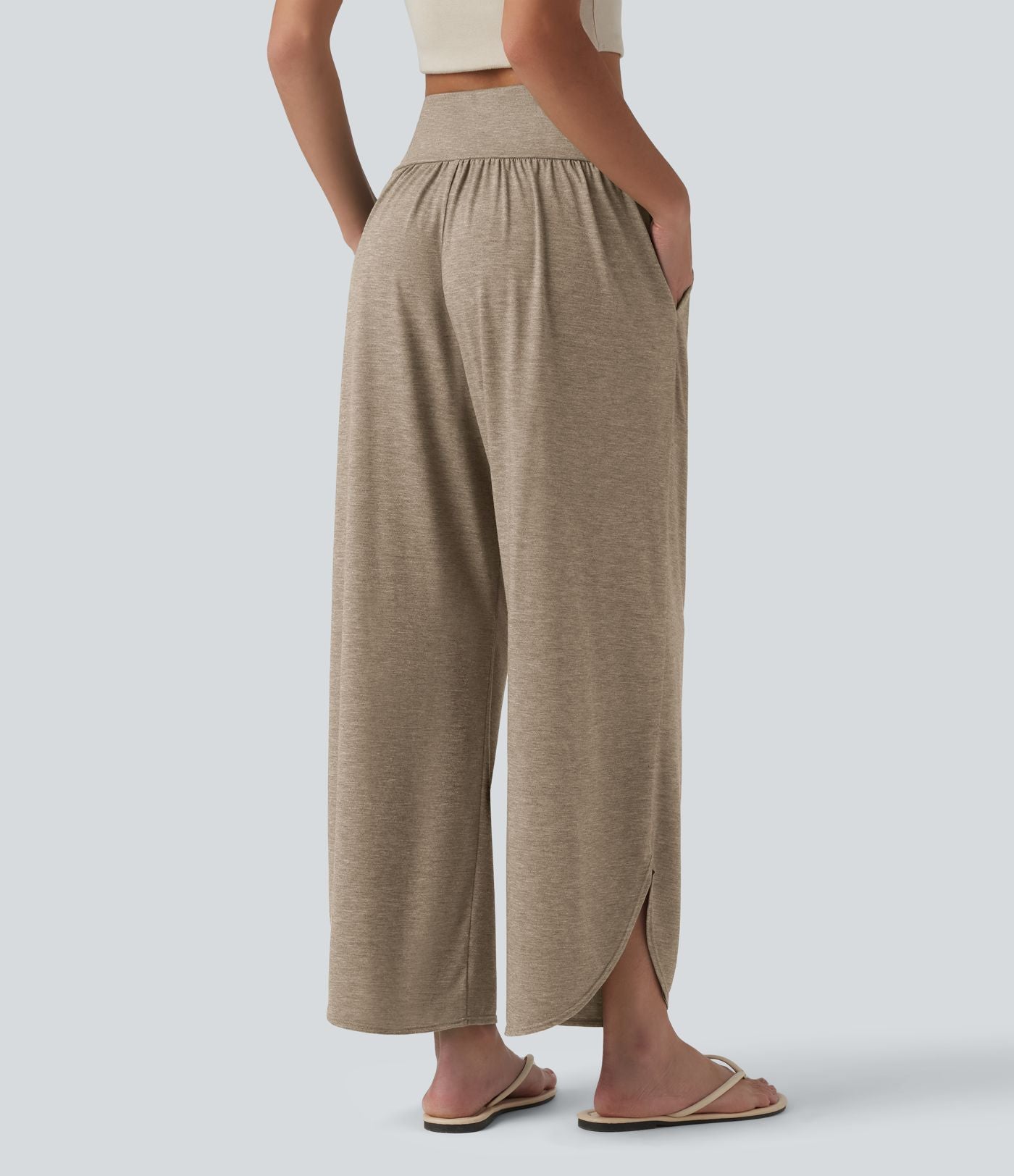 Pantalon décontracté taille haute gainant avec ourlet arrondi et poches