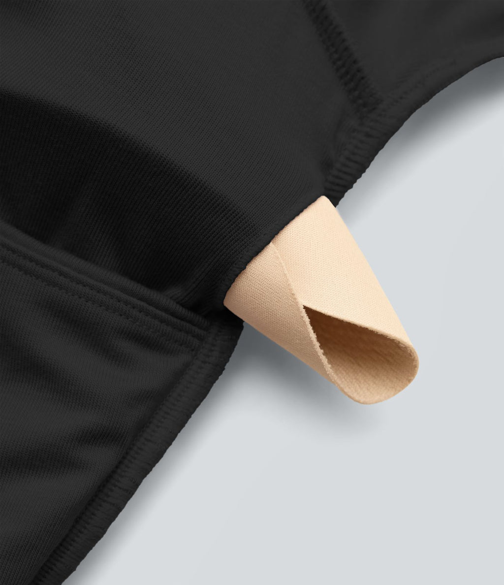 Combinaison casual en maille côtelée dos nu noué épaules dénudées manches longues avec soutien-gorge intégré et poches