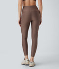 Legging de sport taille haute avec poches latérales effet brillant