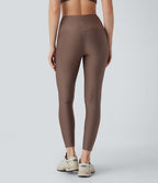 Legging de sport taille haute avec poches latérales effet brillant
