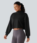 Sweat crop top col montant avec manches longues et coupe décontractée