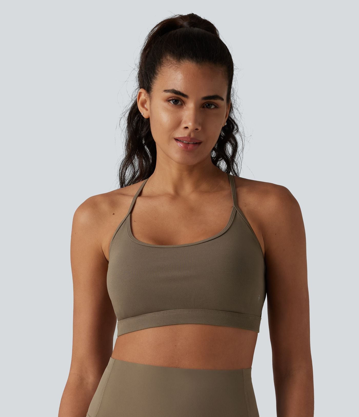 Brassière de sport de yoga en maille côtelée maintien léger dos croisé dos nu avec soutien-gorge intégré