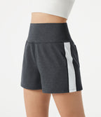 Short baggy de sport taille haute à séchage rapide avec bandes latérales et poches