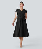 Robe midi Breezeful™ col V manches courtes à liens dans le dos séchage rapide avec poches latérales